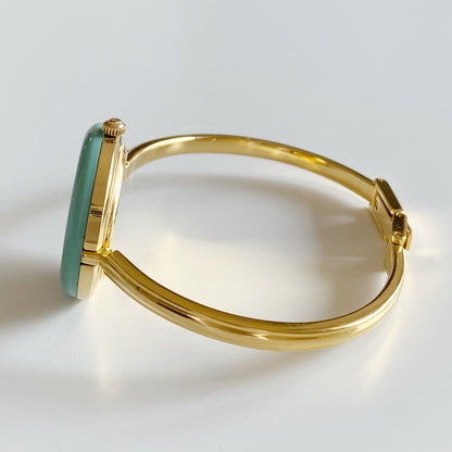 Gucci 1990s Interchangeable Bezel Gold Plated Bangle Watch with 12 bezels, case