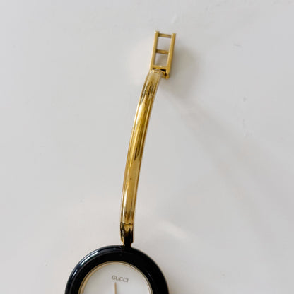 Gucci 1990s Interchangeable Bezel Gold Plated Bangle Watch with 12 bezels, case