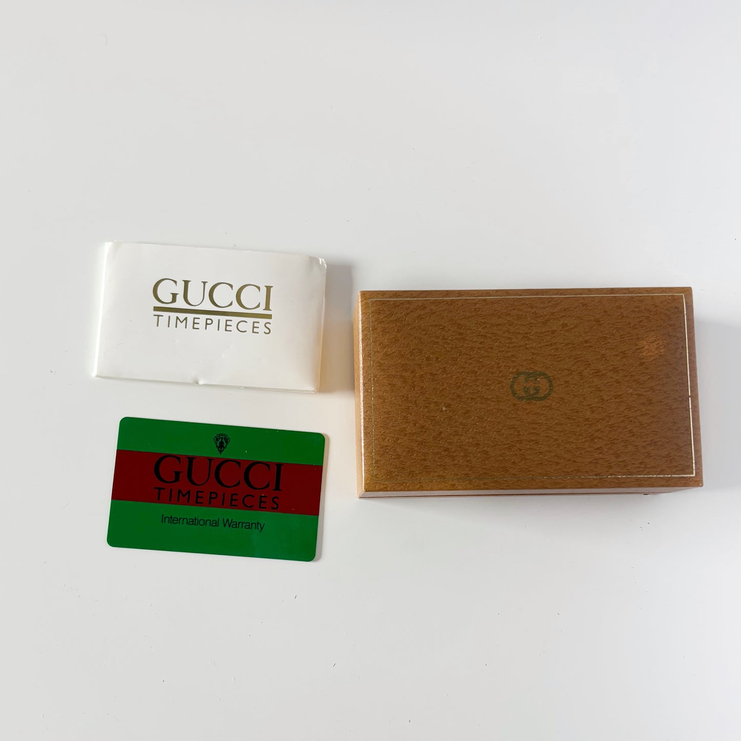 Gucci 1990s Interchangeable Bezel Gold Plated Bangle Watch with 12 bezels, case