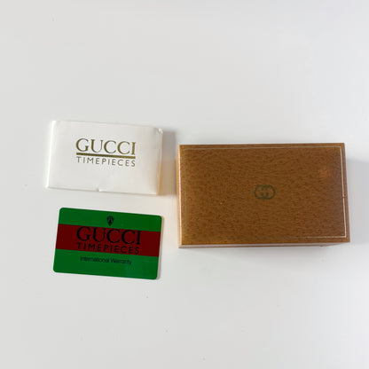 Gucci 1990s Interchangeable Bezel Gold Plated Bangle Watch with 12 bezels, case