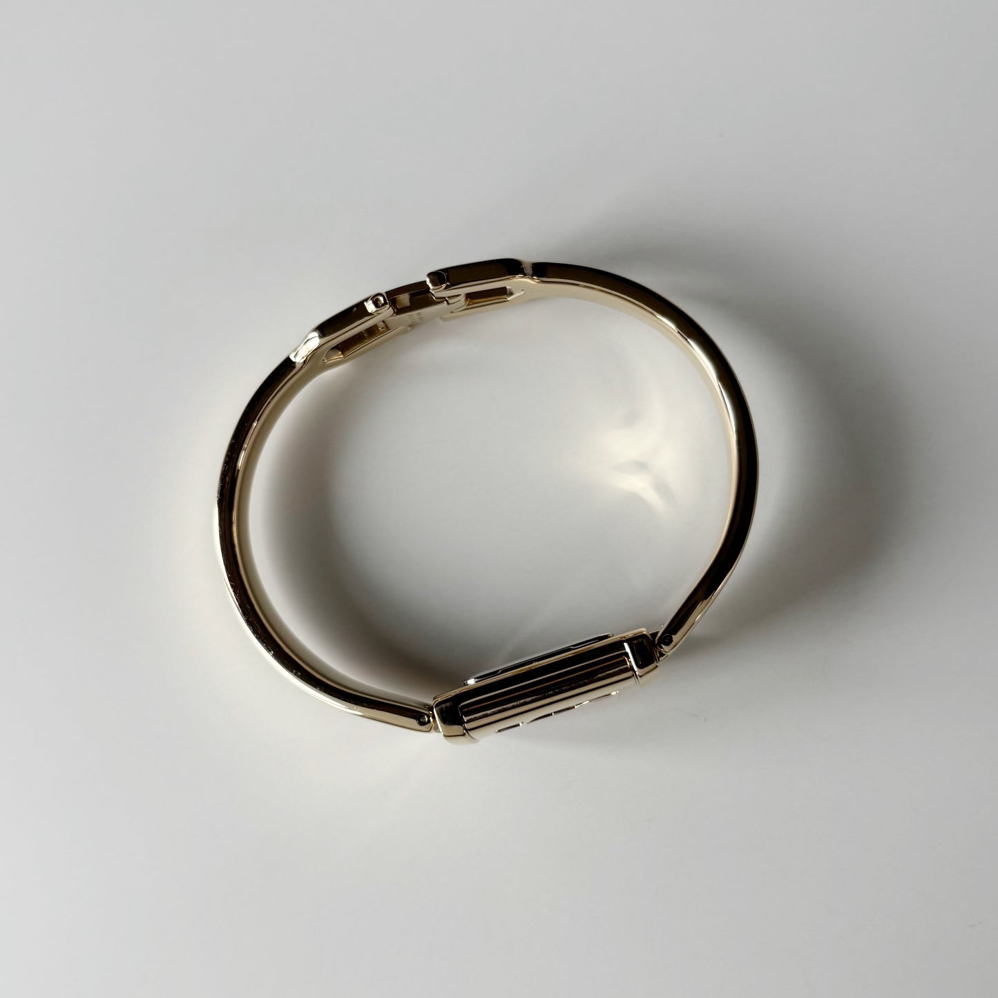 Yves Saint Laurent 1990s Peek-A-Boo Gold Plated Bangle Watch