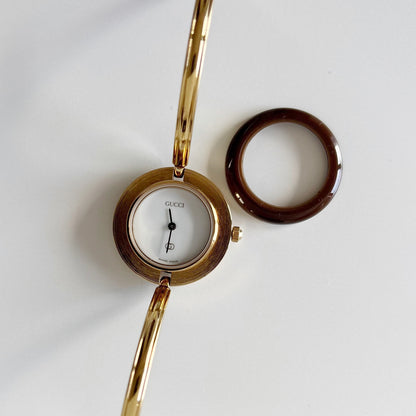 Gucci 1990s Interchangeable Bezel Gold Plated Bangle Watch with 12 bezels, case