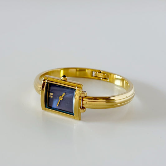 Yves Saint Laurent 1990s Blue Dial Gold Plated Bangle Watch (Small)
