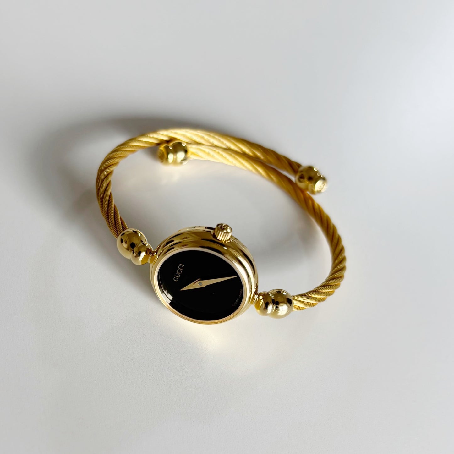 Gucci 1990s Black Dial Gold Plated Cable Band Bangle Watch