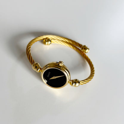 Gucci 1990s Black Dial Gold Plated Cable Band Bangle Watch