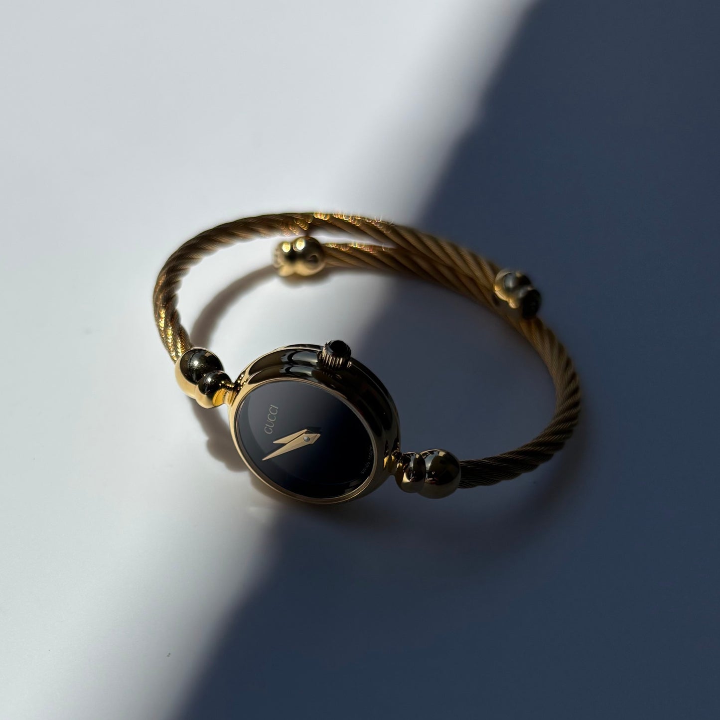 Gucci 1990s Black Dial Gold Plated Cable Bangle Watch