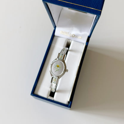 André Mouche Early 2000s Peek-A-Boo Silver Bangle Watch