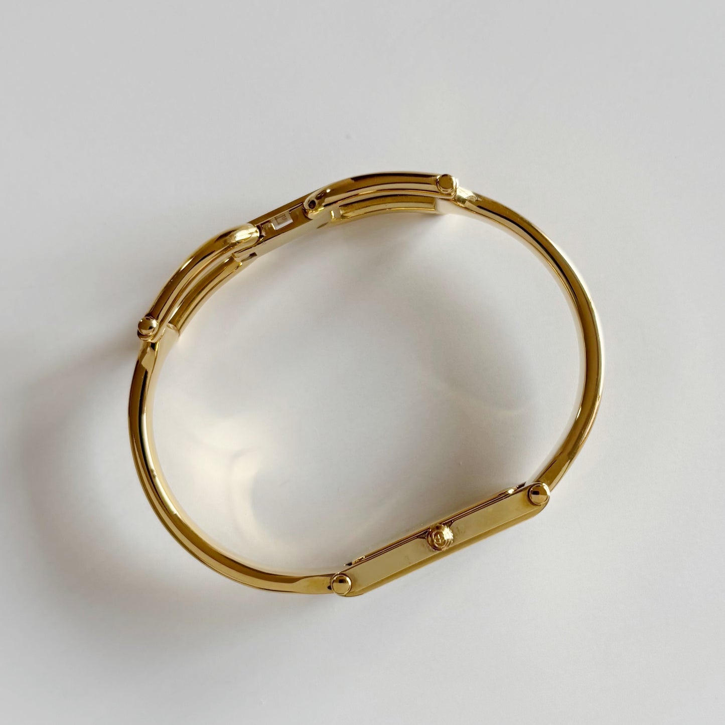Gucci 1990s Gold Dial Rectangular Gold Plated Bangle Watch