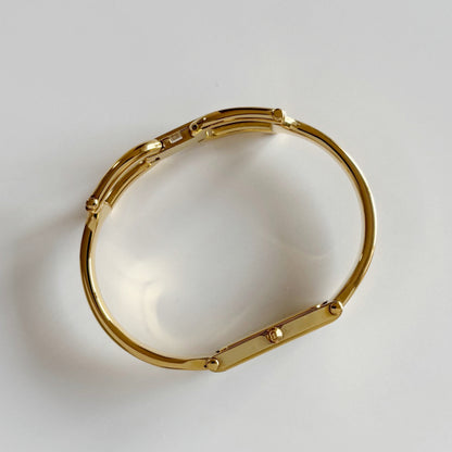 Gucci 1990s Gold Dial Rectangular Gold Plated Bangle Watch