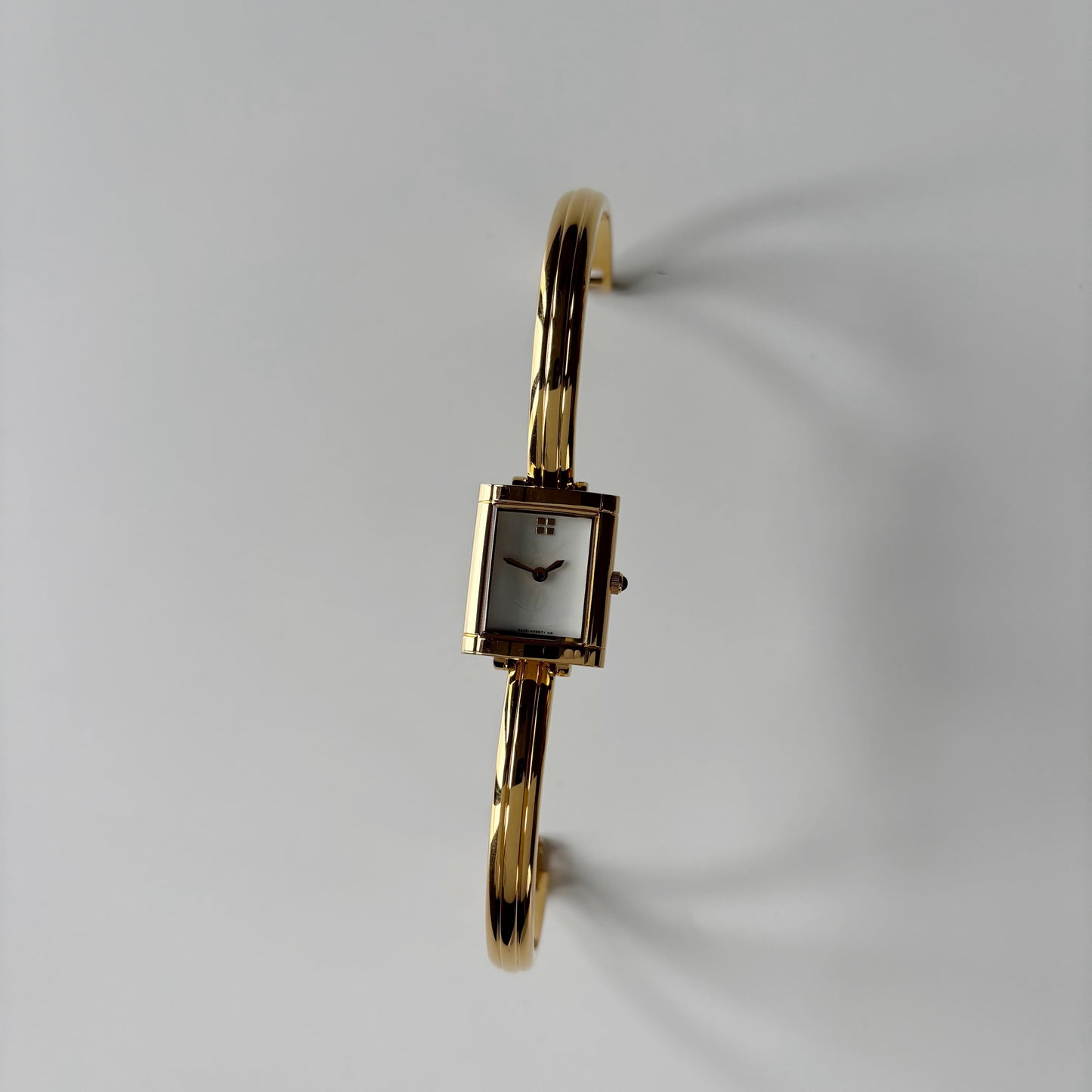 Yves Saint Laurent 1990s Seashell Dial Gold Plated Bangle Watch