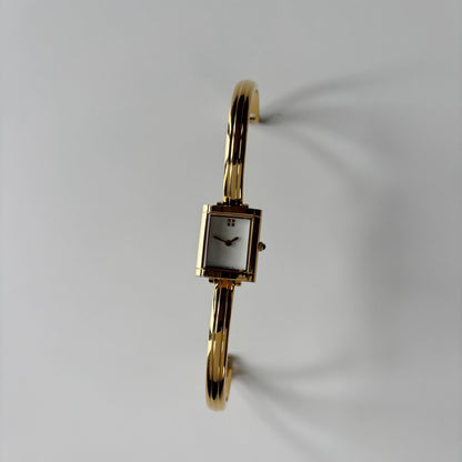 Yves Saint Laurent 1990s Seashell Dial Gold Plated Bangle Watch
