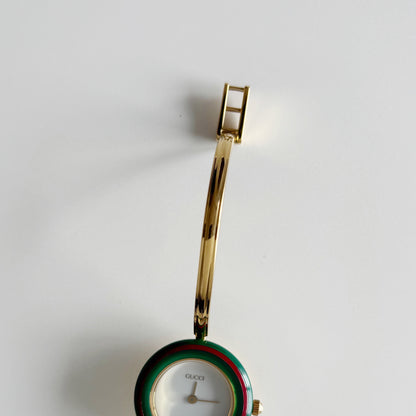 Gucci 1990s Interchangeable Bezel Gold Plated Bangle Watch with 12 bezels, case