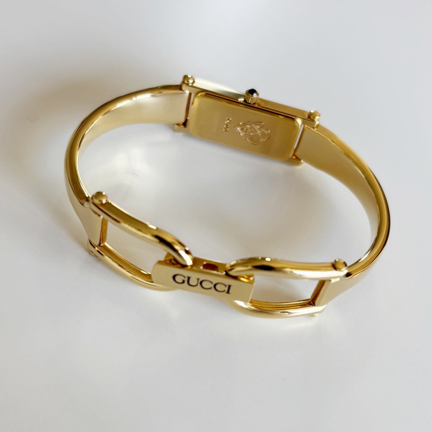 Gucci 1990s Rectangular Dial Gold Plated Bangle Watch