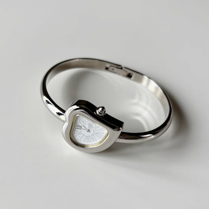 Yves Saint Laurent 1990s Heart Shaped Dial Silver Bangle Watch