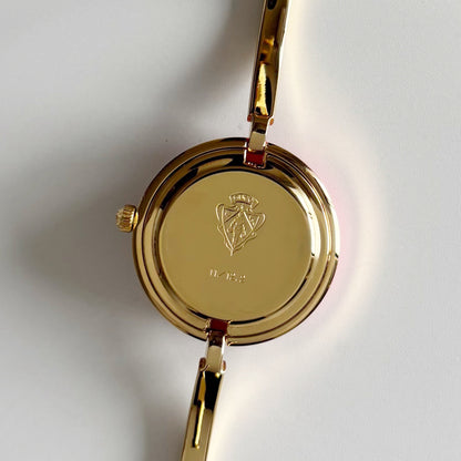 Gucci 1990s Interchangeable Bezel Gold Plated Bangle Watch with 12 bezels, case