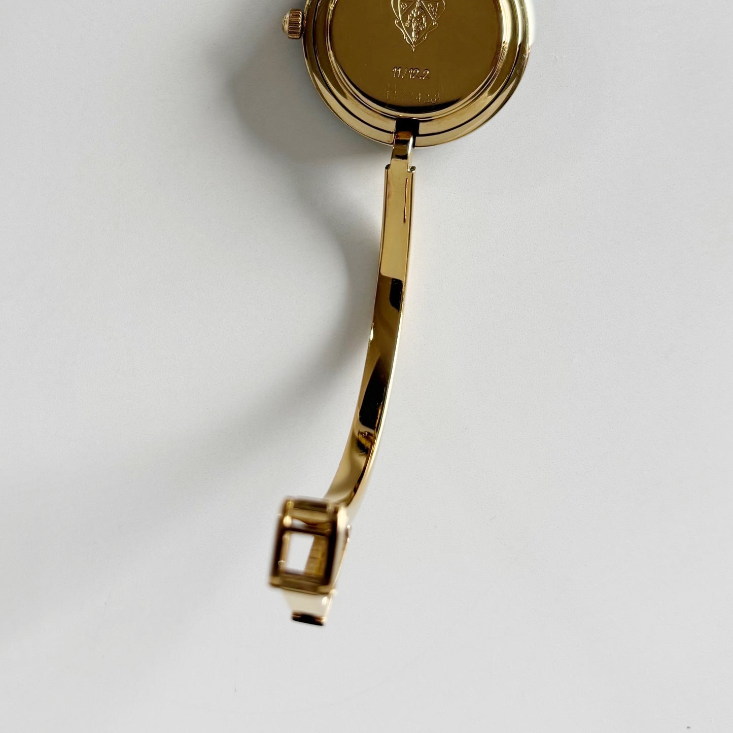 Gucci 1990s Interchangeable Bezel Gold Plated Bangle Watch with 12 bezels, case
