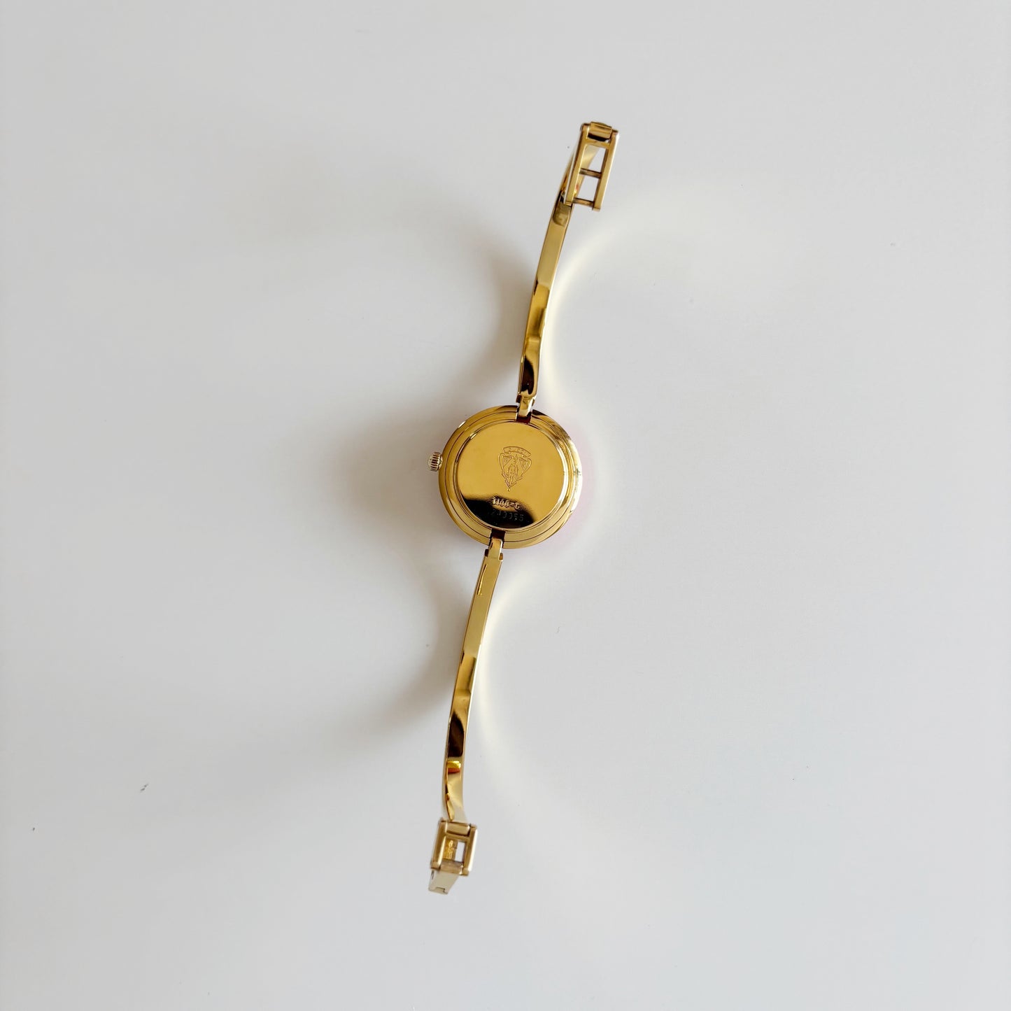 Gucci 1990s Interchangeable Bezel Gold Plated Bangle Watch with 12 bezels, case