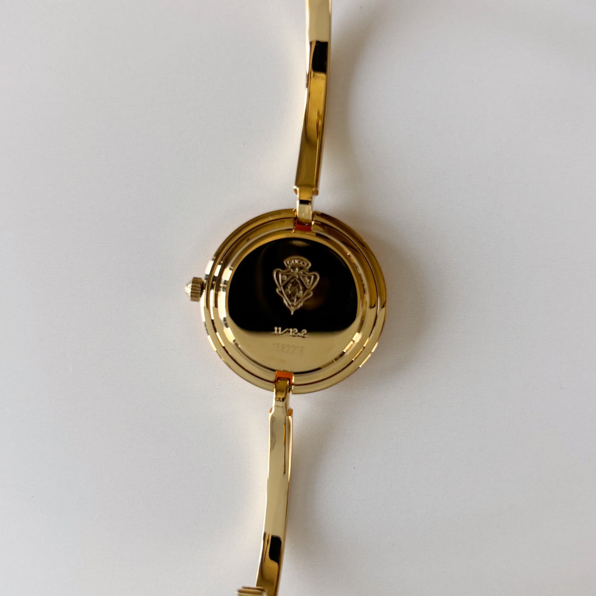Gucci 1990s Interchangeable Bezel Gold Plated Bangle Watch with 12 bezels, case