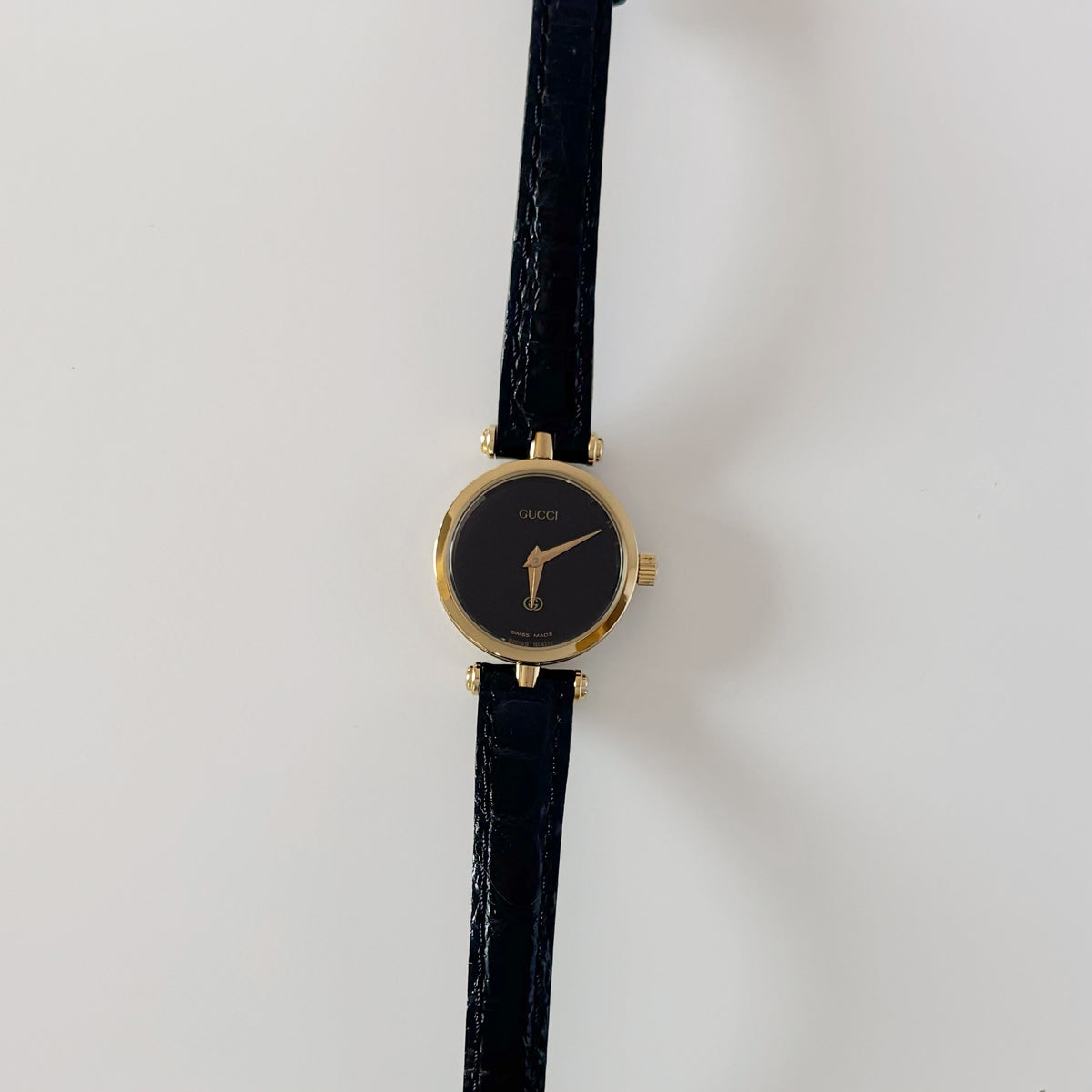 Gucci 1980s Black Dial Round Gold-Plated Watch