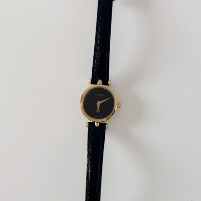 Gucci 1980s Black Dial Round Gold-Plated Watch