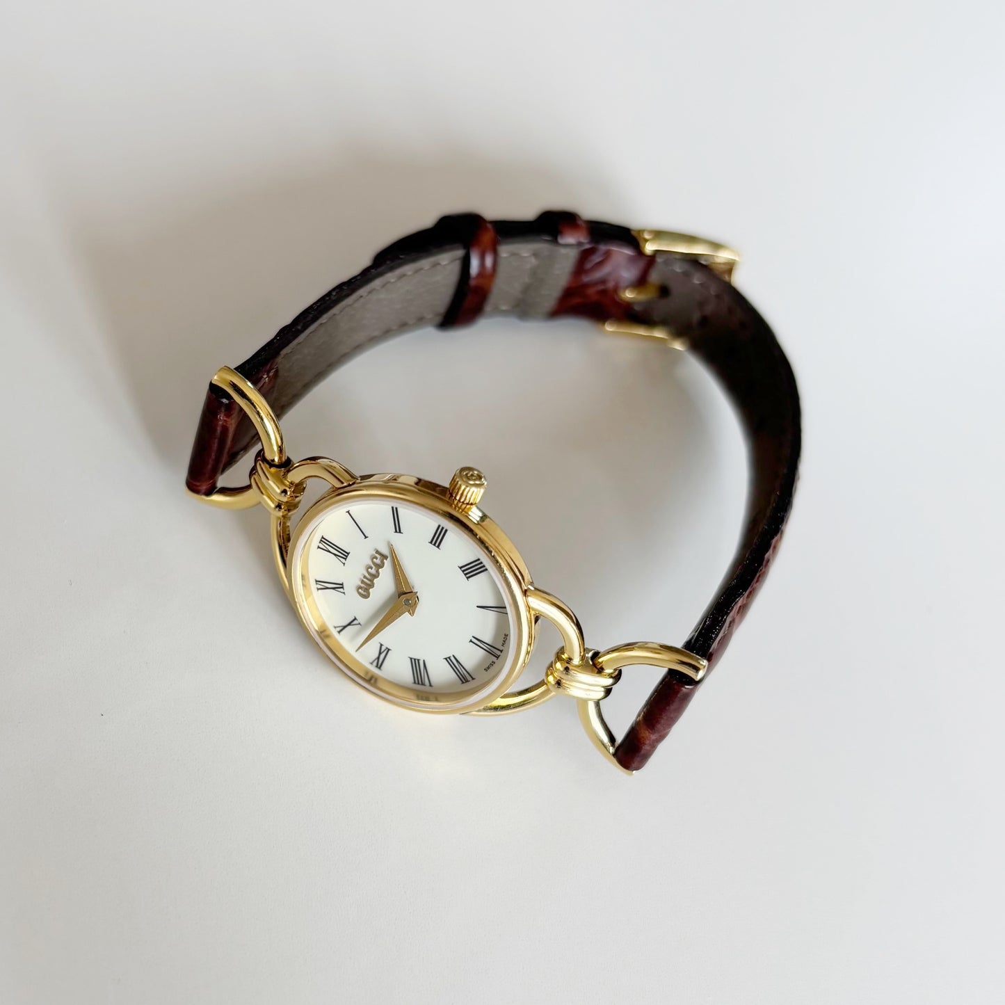 Gucci 1990s Round Dial Gold Plated Horsebit Watch