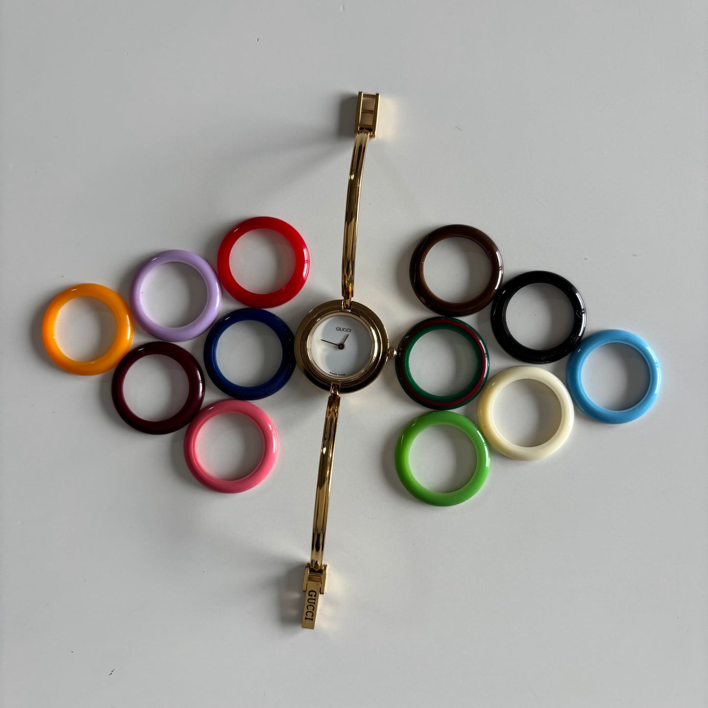 Gucci 1990sInterchangeable Bezel Gold Plated Bangle Watch with 12 bezels, case