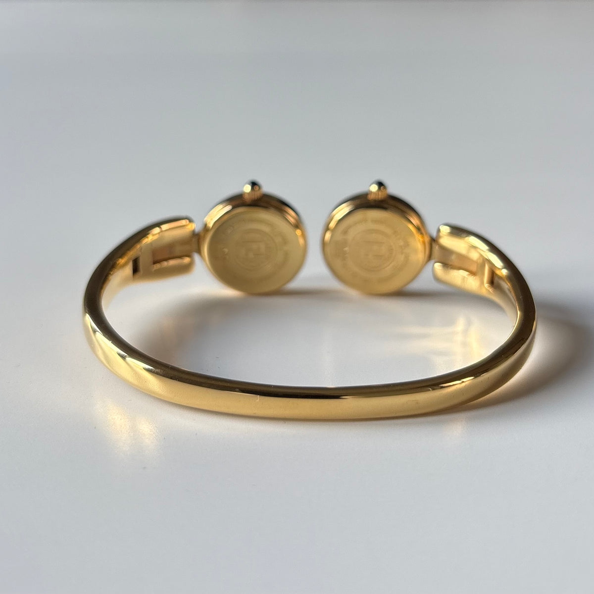 Fendi 1990s Seashell Dial Two Time Zone Gold Plated Bangle Watch