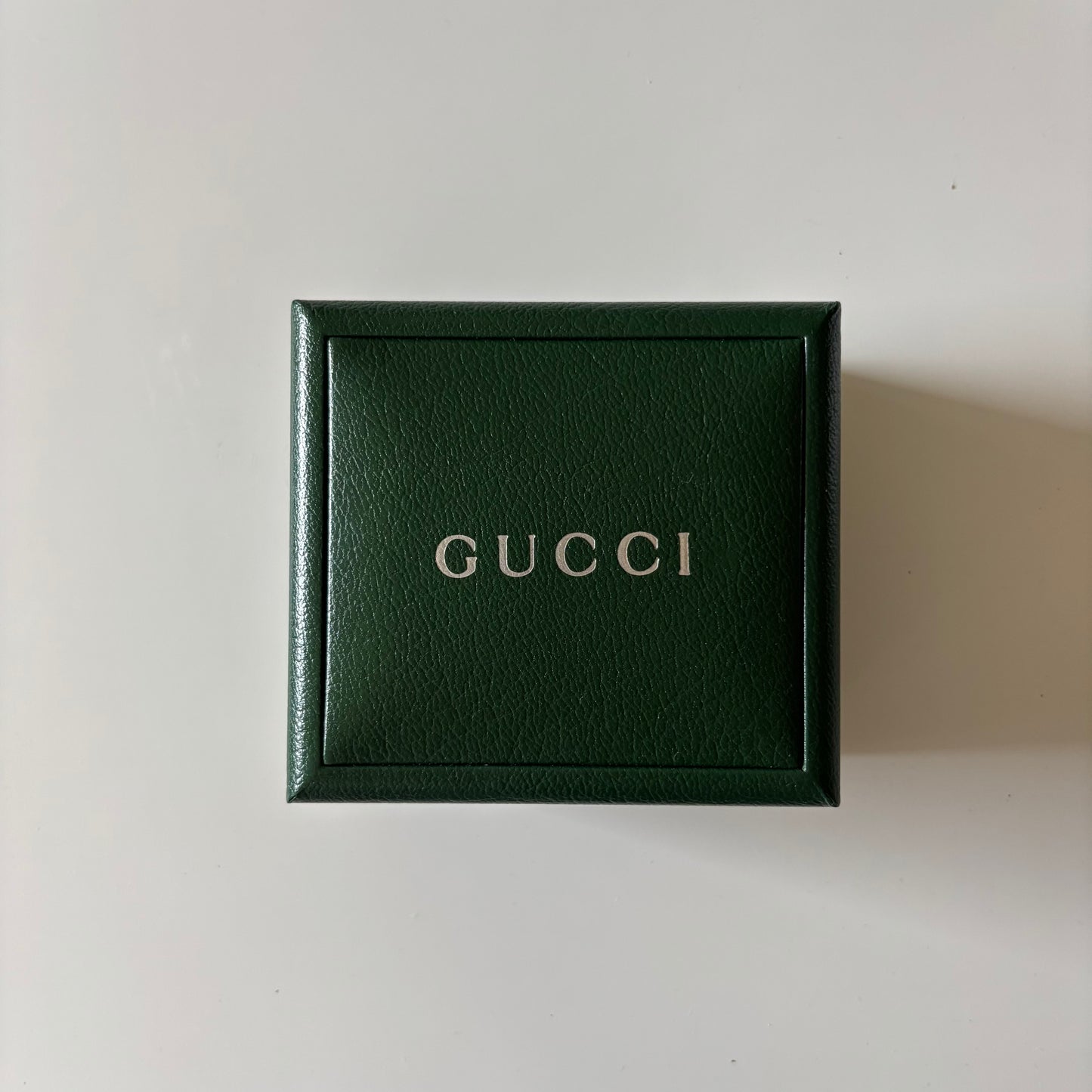 Gucci 1990s Rectangular Black Dial Gold Plated Bangle Watch