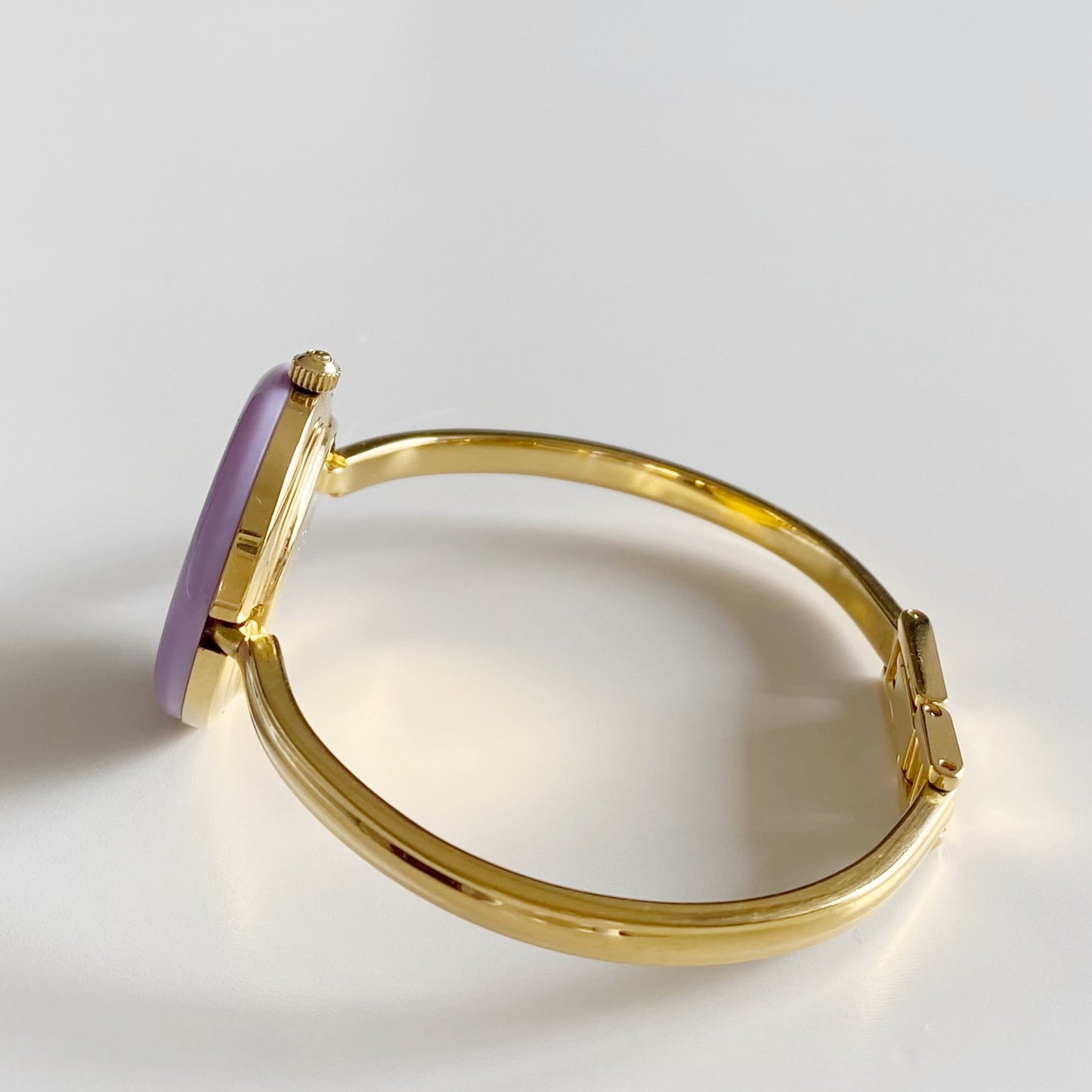 Gucci 1990s Interchangeable Bezel Gold Plated Bangle Watch with 12 bezels, case