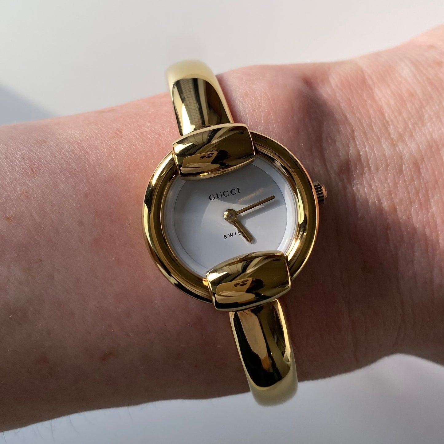 Gucci 1990s Round Dial Gold Plated Bangle Watch