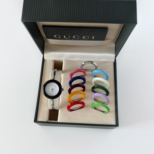 Gucci 1990s Interchangeable Bezel Stainless steel Bangle Watch with 12 bezels, case