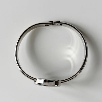 Yves Saint Laurent 1990s Heart Shaped Dial Silver Bangle Watch