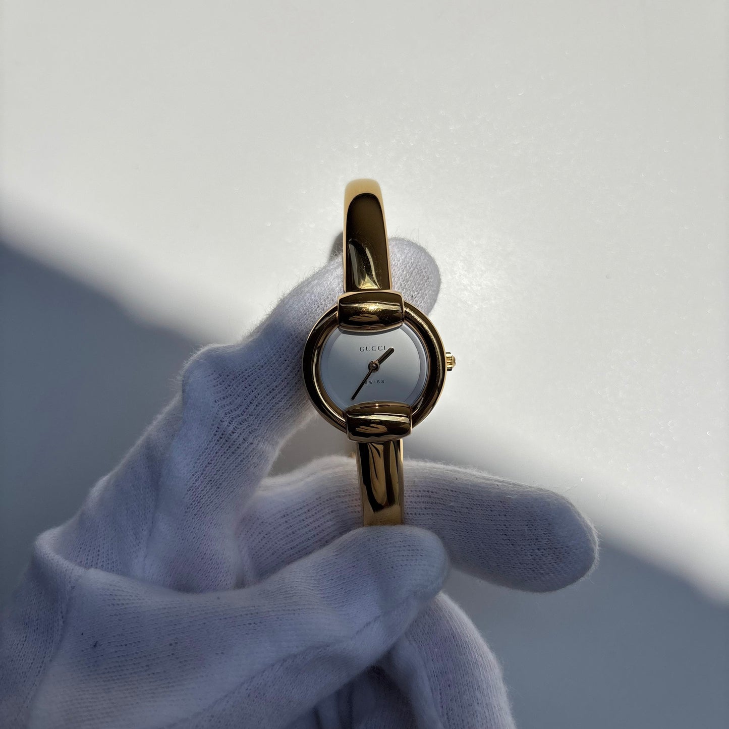 Gucci 1990s Round Dial Gold Plated Bangle Watch