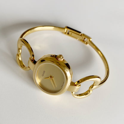 Gucci 1990s Gold Dial Gold Plated Bangle Watch