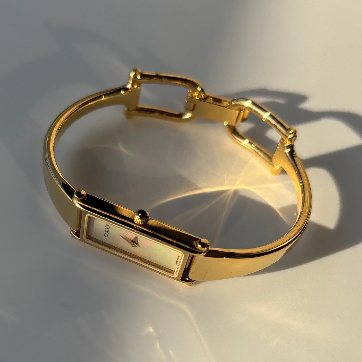 Gucci 1990s Seashell Dial Rectangular Gold Plated Bangle Watch