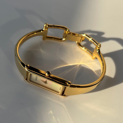 Gucci 1990s Seashell Dial Rectangular Gold Plated Bangle Watch