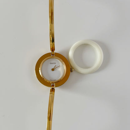 Gucci 1990s Interchangeable Bezel Gold Plated Bangle Watch with 12 bezels, case