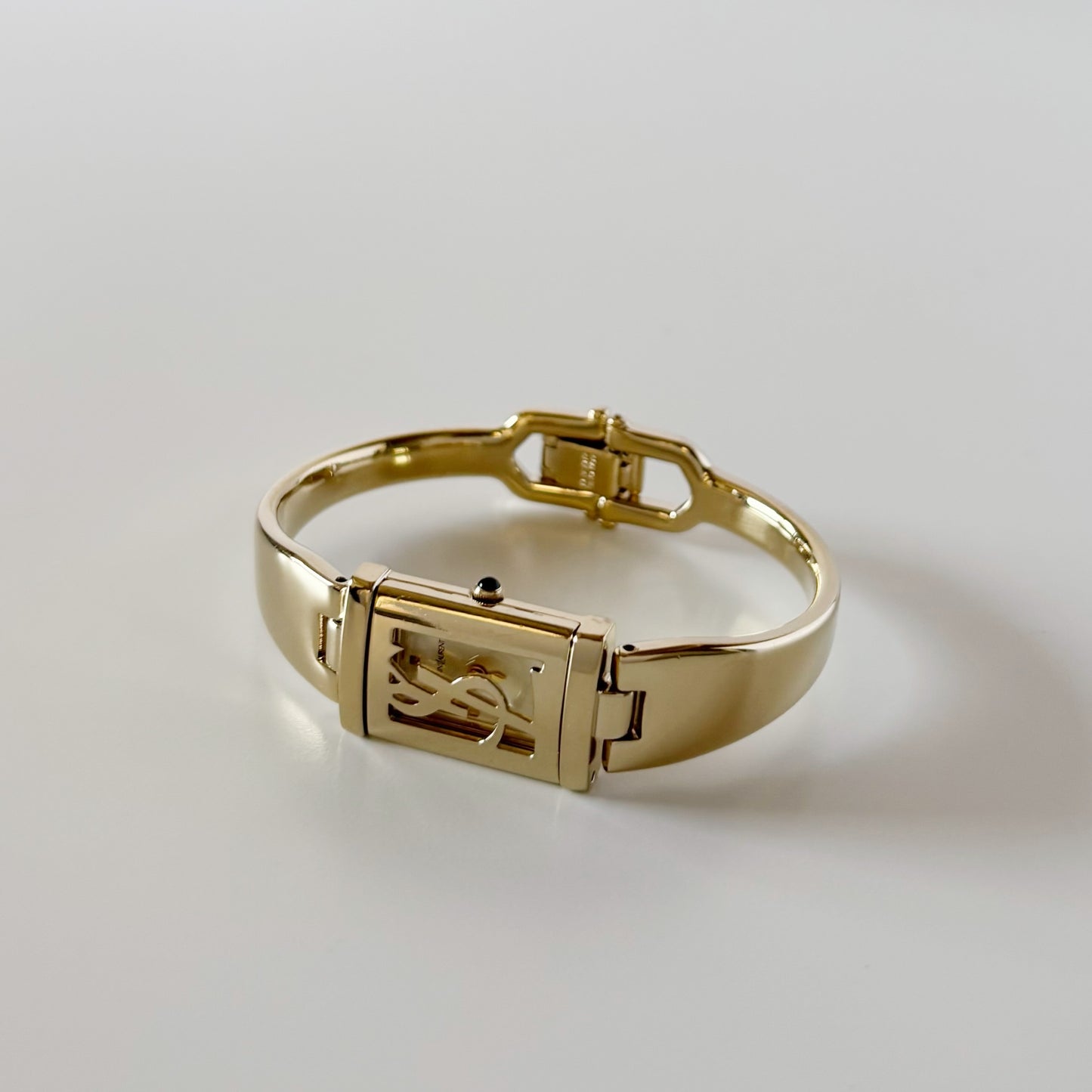 Yves Saint Laurent 1990s Peek a boo Gold Plated Bangle Watch
