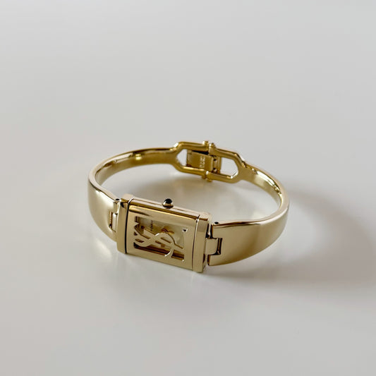 Yves Saint Laurent 1990s Peek a boo Gold Plated Bangle Watch