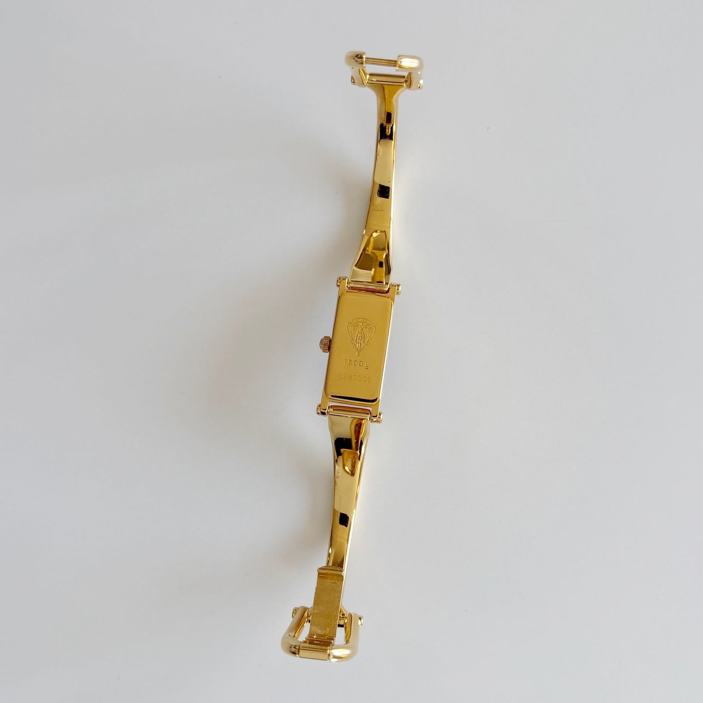 Gucci 1990s Black Rectangular Dial Gold Plated Bangle Watch