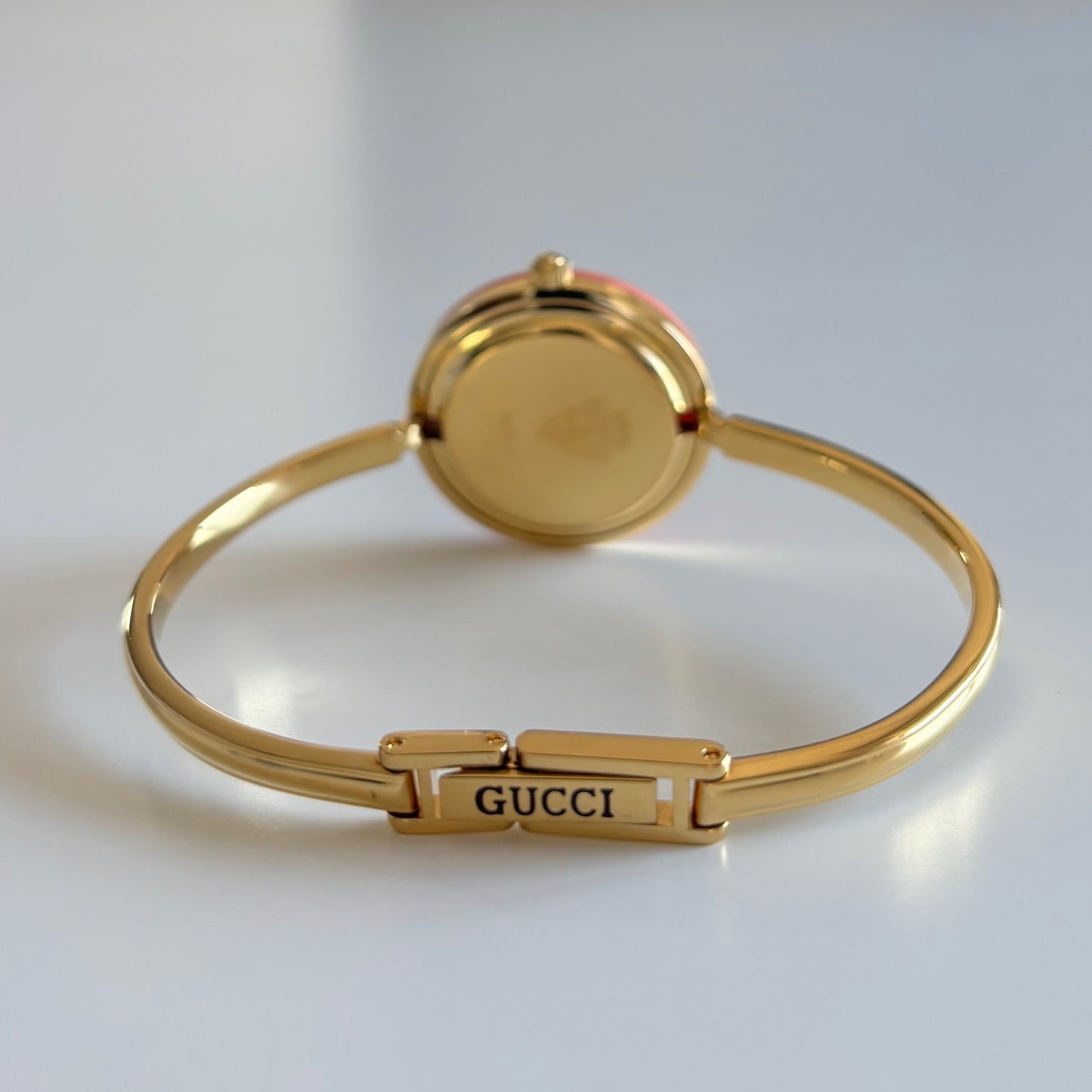 Gucci 1990s Interchangeable Bezel Gold Plated Bangle Watch with 12 bezels, case