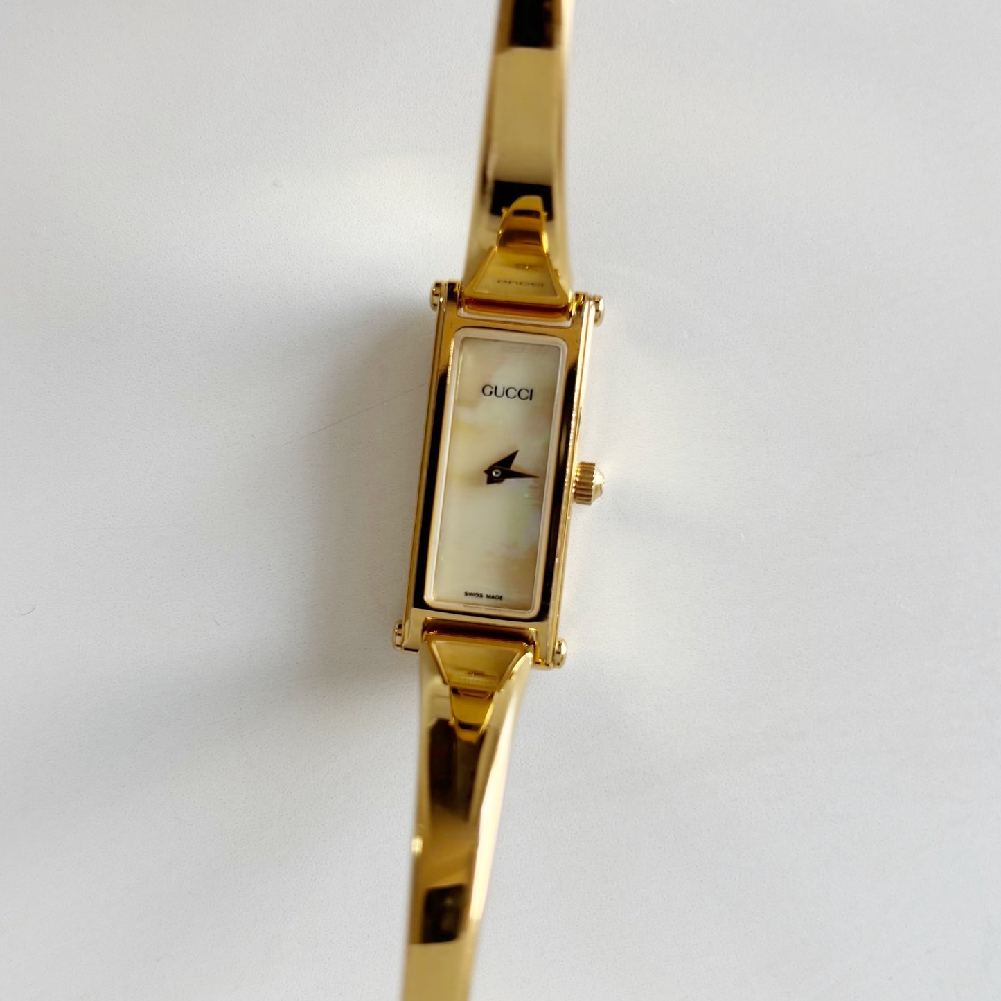 Gucci 1990s Rectangular Seashell Dial Gold Plated Bangle Watch