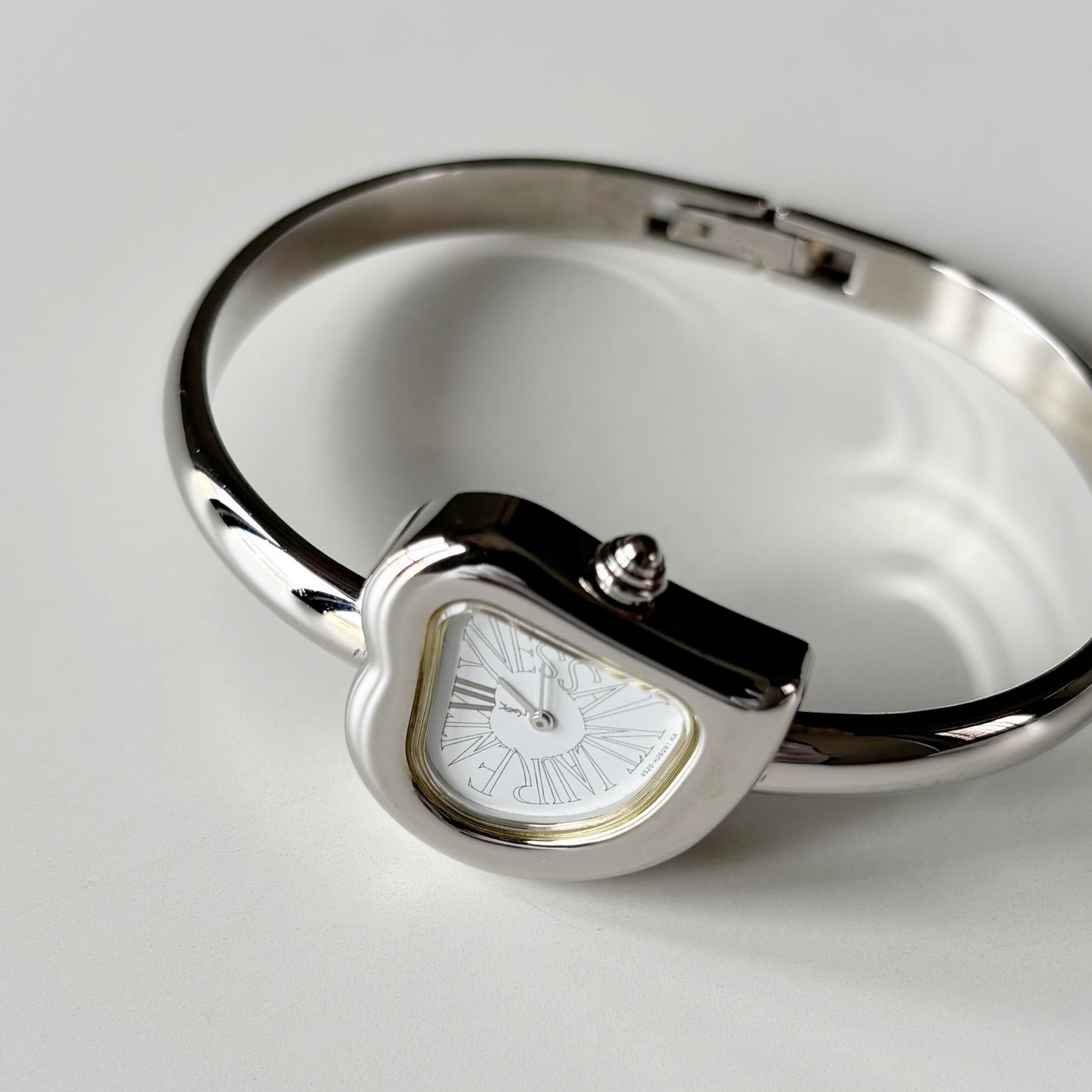 Yves Saint Laurent 1990s Heart Shaped Dial Silver Bangle Watch