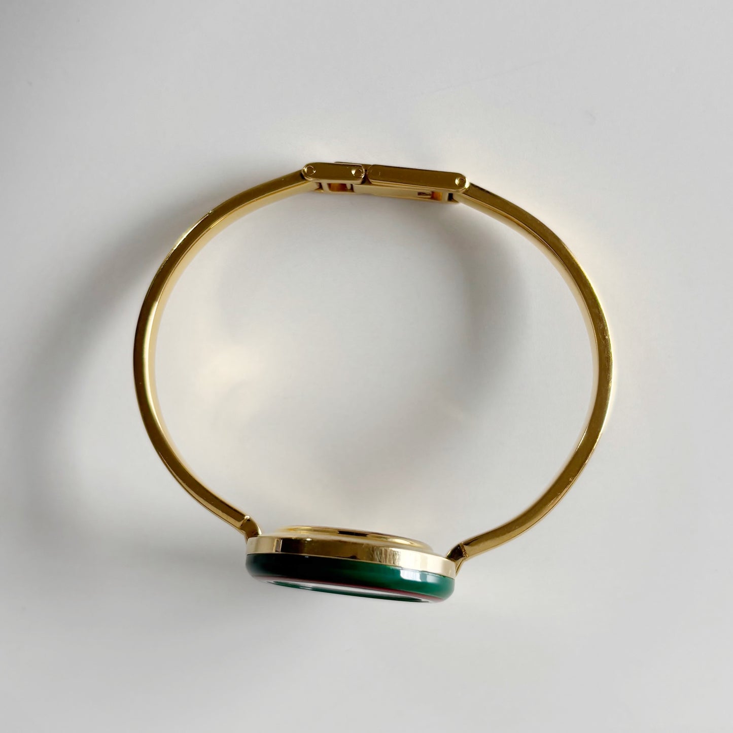 Gucci 1990s Interchangeable Bezel Gold Plated Bangle Watch with 12 bezels, case