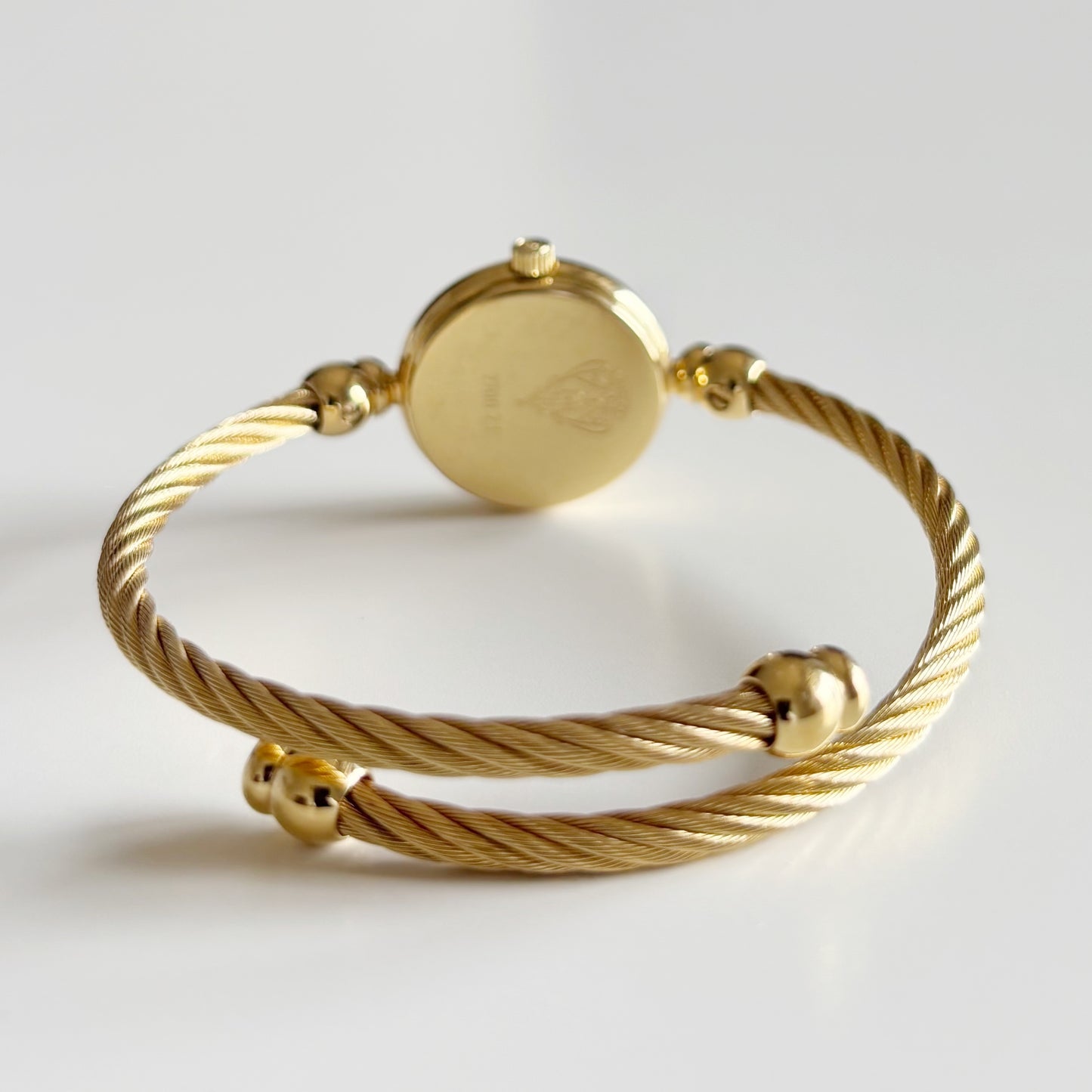 Gucci 1990s Seashell Dial Gold Plated Cable Bangle Watch