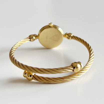 Gucci 1990s Seashell Dial Gold Plated Cable Bangle Watch