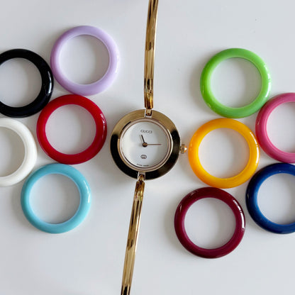 Gucci 1990s Interchangeable Bezel Gold Plated Bangle Watch with 12 bezels, case