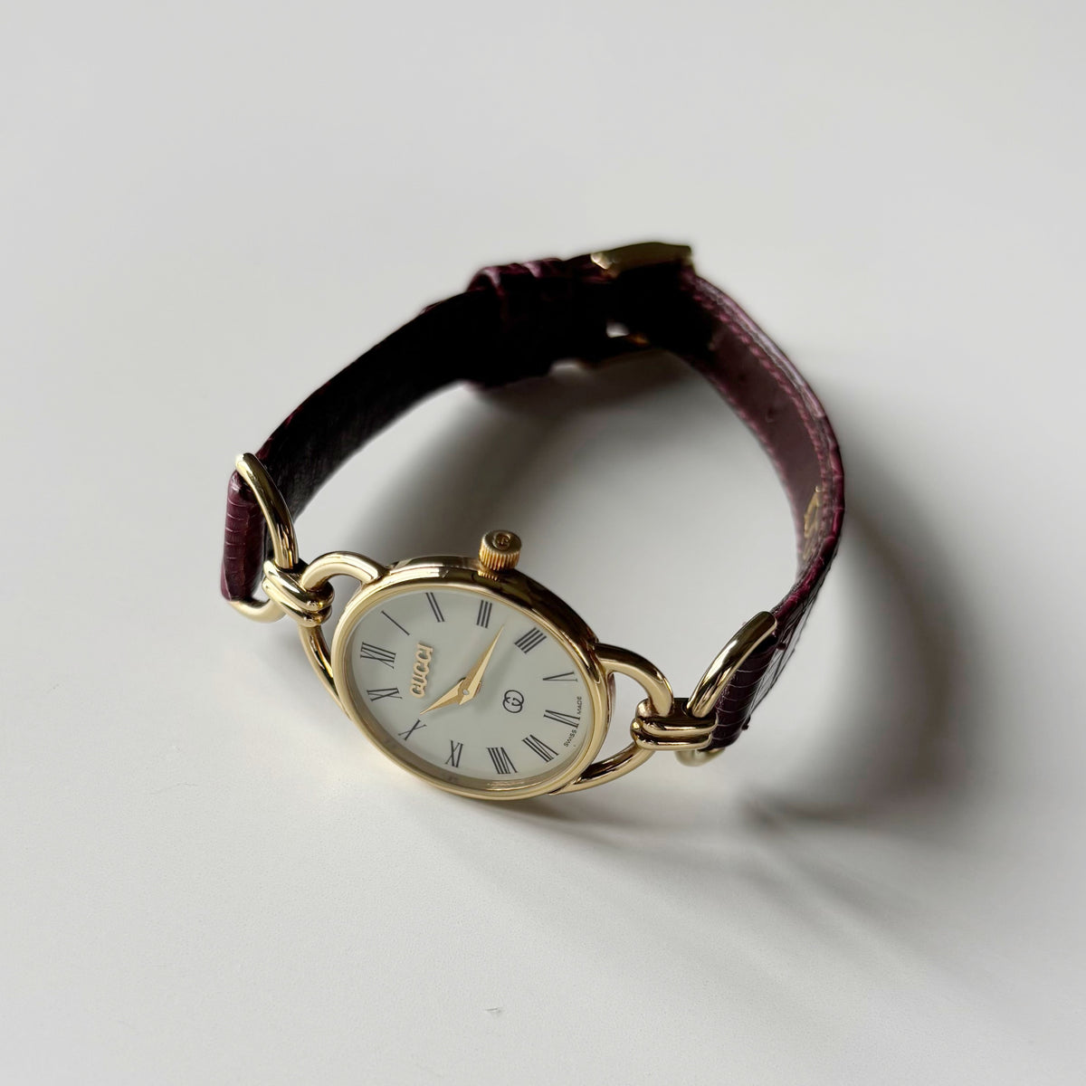 Gucci 1980s Cream Round Dial Horsebit Gold-Plated Watch