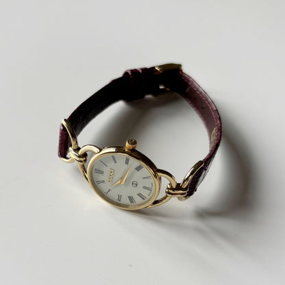 Gucci 1980s Cream Round Dial Horsebit Gold-Plated Watch