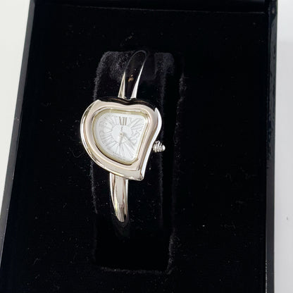 Yves Saint Laurent 1990s Heart Shaped Dial Silver Bangle Watch